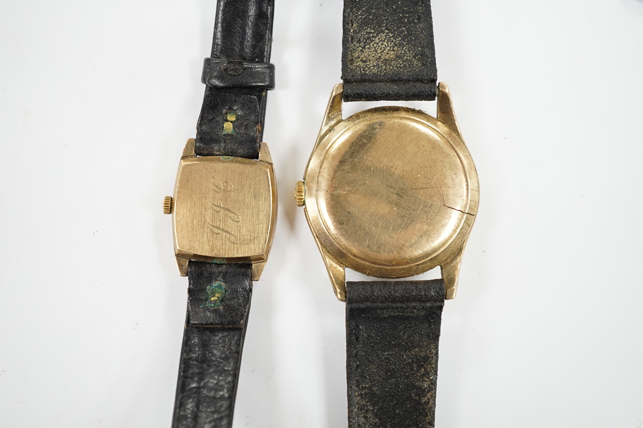 A gentleman's 9ct gold Omega manual wind wrist watch, on associated strap and a lady's 9ct gold Omega manual wind wrist watch.